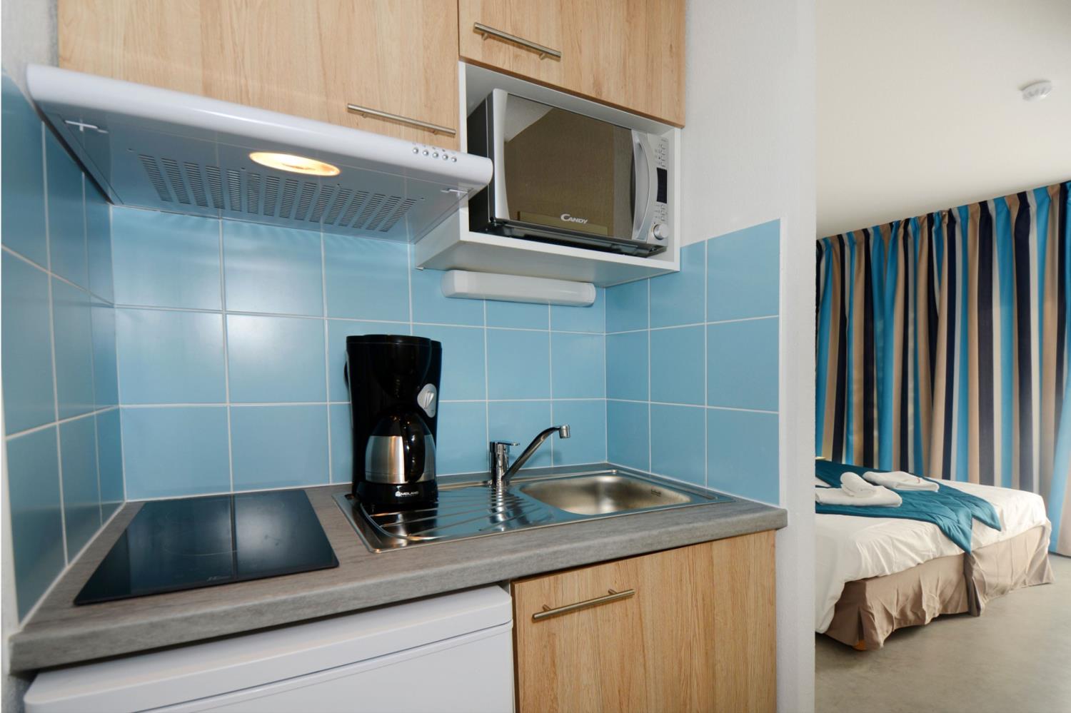 Swimming pool area near Appart'Hôtel Nakâra Suite 2/4 in France