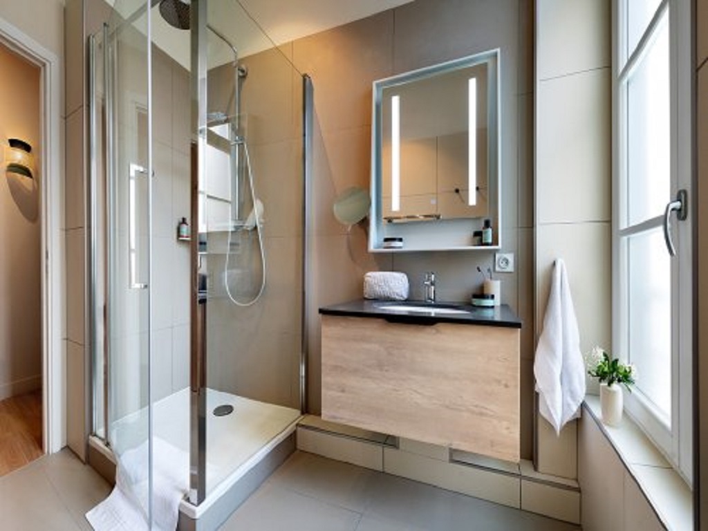 Swimming pool area near Presqu'Ile de la Touques 2p4p A/C in France