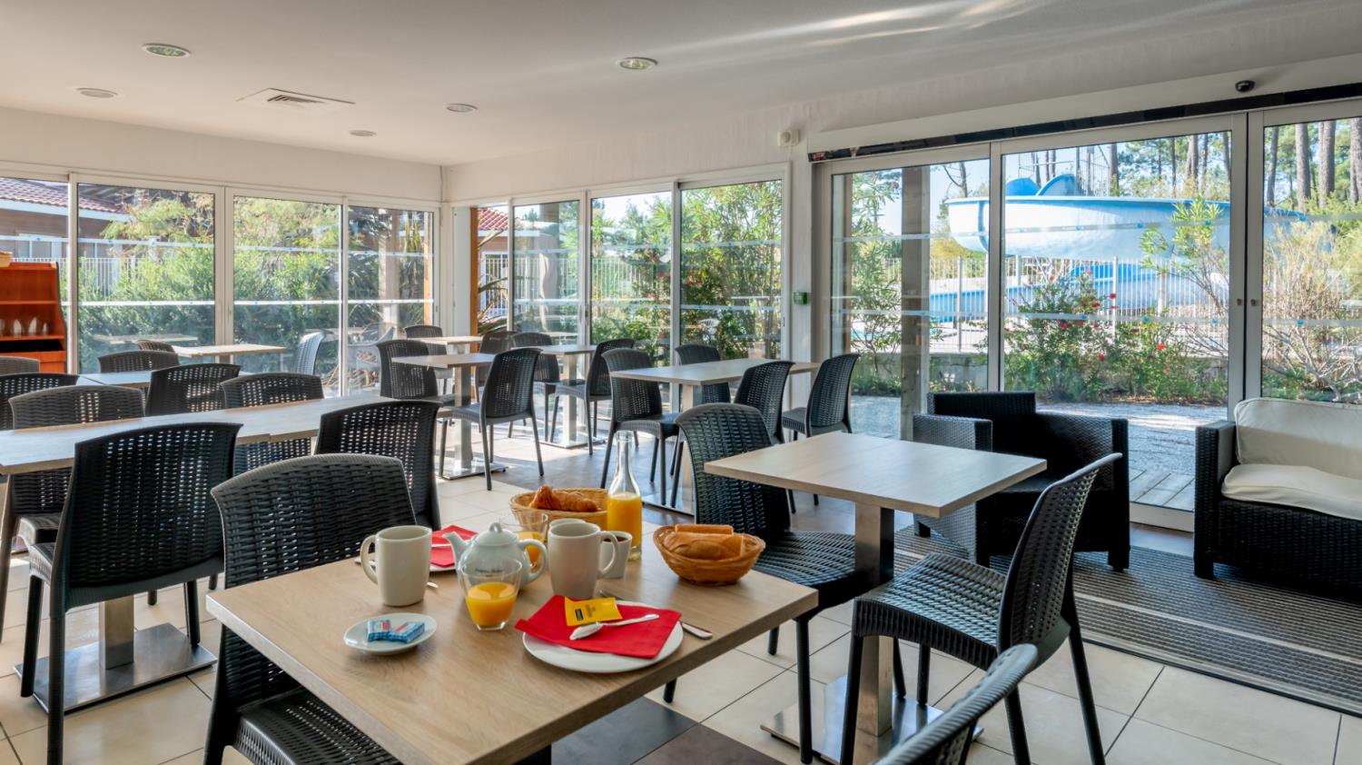 Outdoor terrace and garden at Le Domaine des Grands Lacs*** 2P4S in France