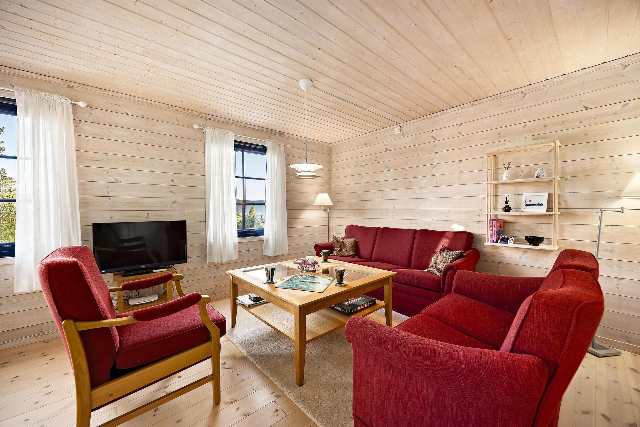 Outdoor terrace and garden at Marit's Hytte 6p in NO