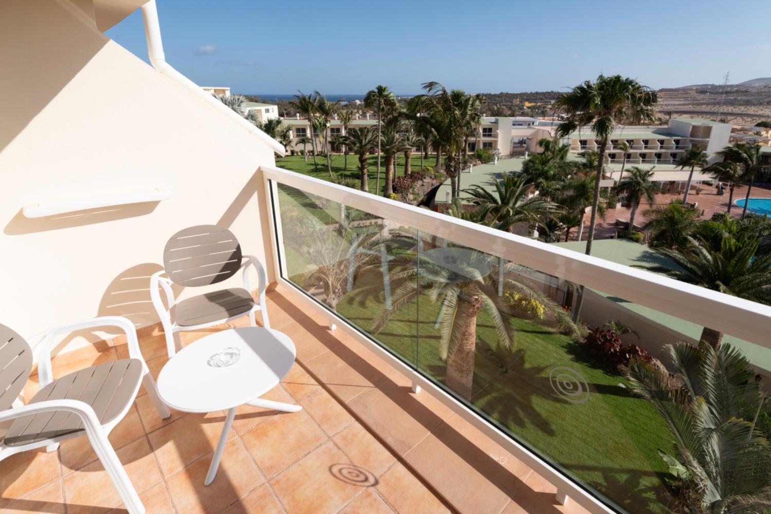 Outdoor terrace and garden at Hotel Drago Park Duplex in Spain