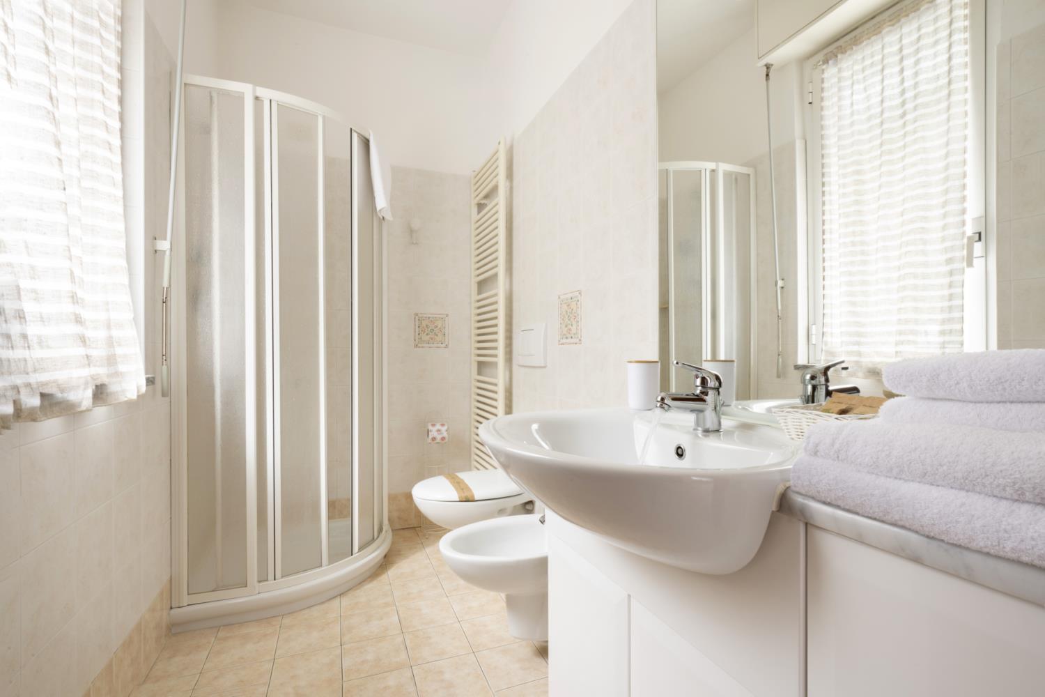 Swimming pool area near Bilocale 6 with balcony/terrace in Italy